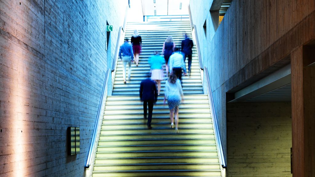 TRUMPF employees walking upstairs