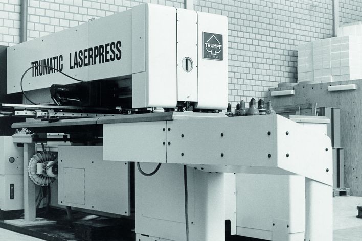 historical picture showing a combined punching and laser-cutting machine of TRUMPF